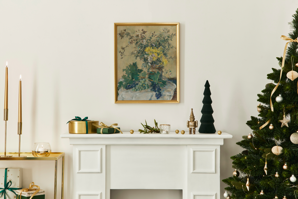 oak and robin gold framed still life art on top of a christmas holiday mantel with gold and green holiday home decor